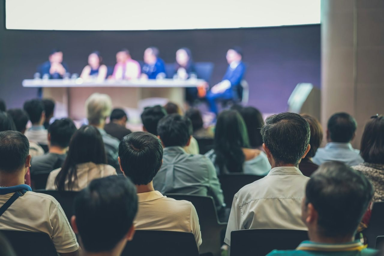 rear-view-of-audience-in-the-conference-hall-or-seminar-meeting.jpg